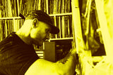 Marco Polo digging through his record shelves