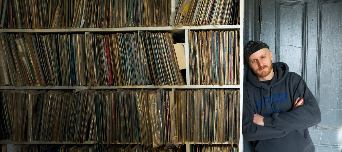 Marco Polo in front of his record shelves